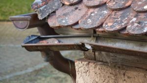 rusted gutters on a home