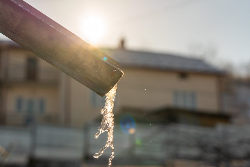 melting icicles on a gutter