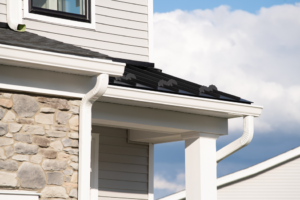 a closeup of a home’s decorated gutters 