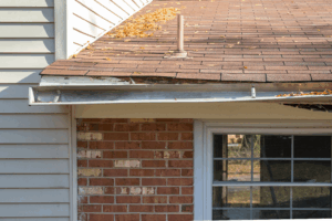 a close-up of a gutters that are damaged